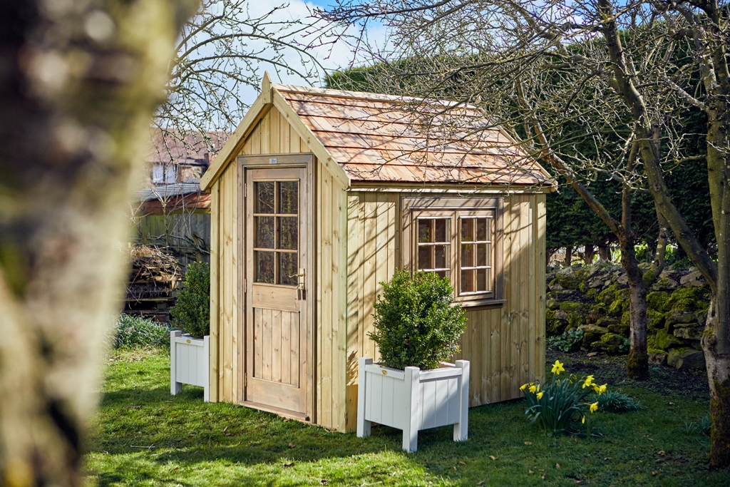 The Potting shed with cedar roof 
