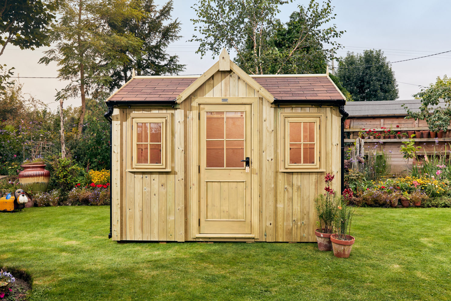 Comfortably Posh Sheds include guttering