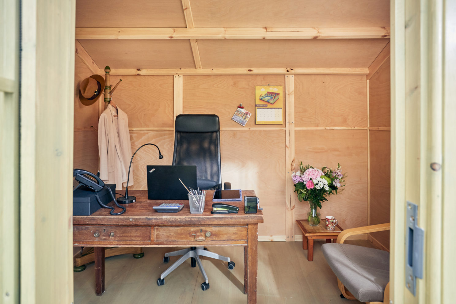 Insulated Shed Office with desk and chair