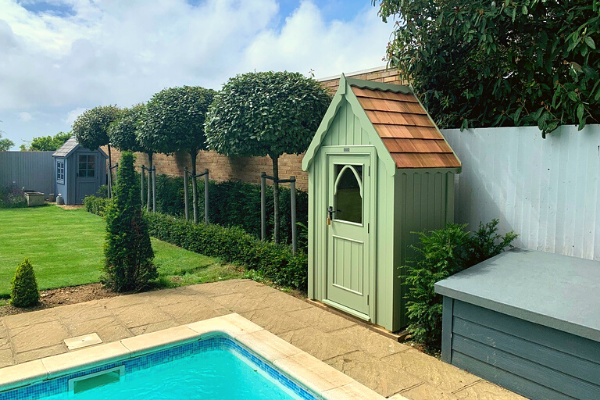 Pretty painted pool house