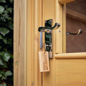 Brass coloured door handle
