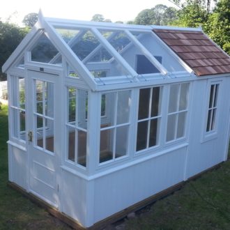 Posh garden shed with greenhouse