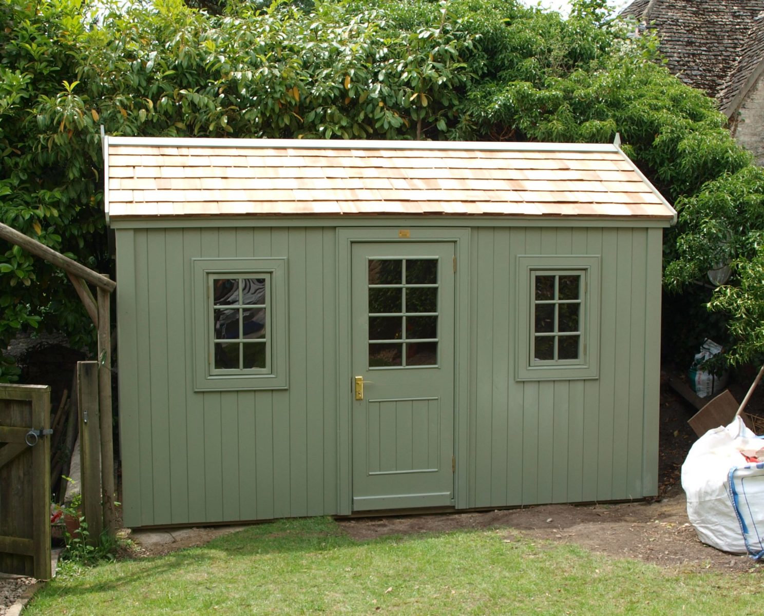 Large bespoke potting style shed with cedar roof tiles